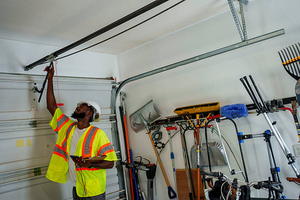 Professional Garage Door Panel Replacement technician working in Marlborough, MA